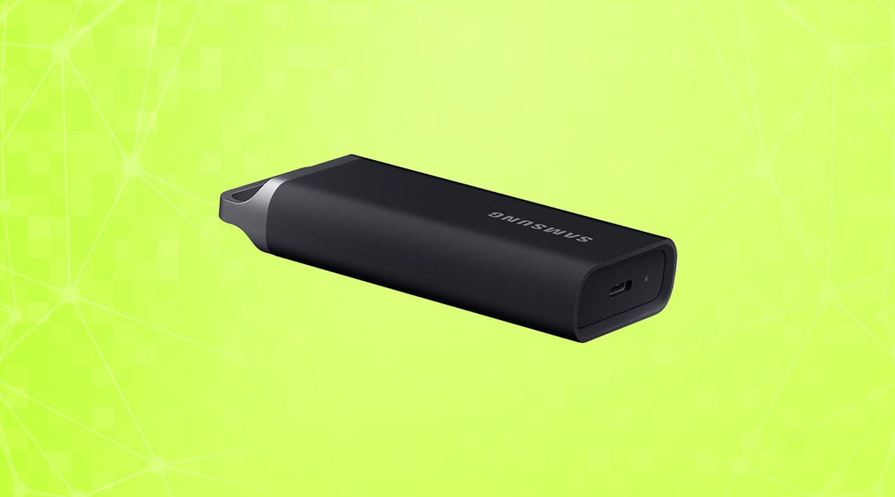 A Samsung T5 Evo portable SSD on a green background